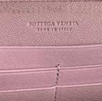 Portefeuille zippé en cuir nappa intrecciato rose
