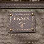 Bolso bandolera con cremallera lateral de piel Vitello Daino gris