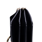Bolso de hombro mediano Faye de piel de becerro negra