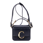 Bolso de hombro mini bandolera C de piel de becerro negra