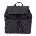 Mochila de lona con monograma negro pequeño con solapa y bolsillo frontal con cremallera
