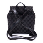 Mochila de lona con monograma negro pequeño con solapa y bolsillo frontal con cremallera