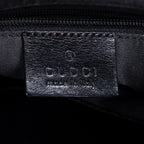 Mochila de lona con monograma negro pequeño con solapa y bolsillo frontal con cremallera