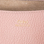 Bolso de hombro Drew Crossbody de piel de becerro granulada rosa