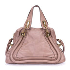 Sac à bandoulière Paraty moyen en cuir de veau grainé rose foncé