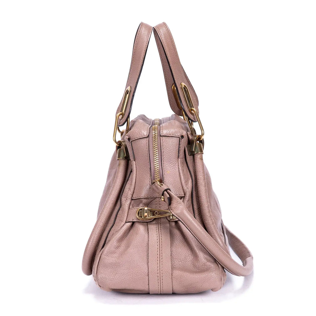 Sac à bandoulière Paraty moyen en cuir de veau grainé rose foncé