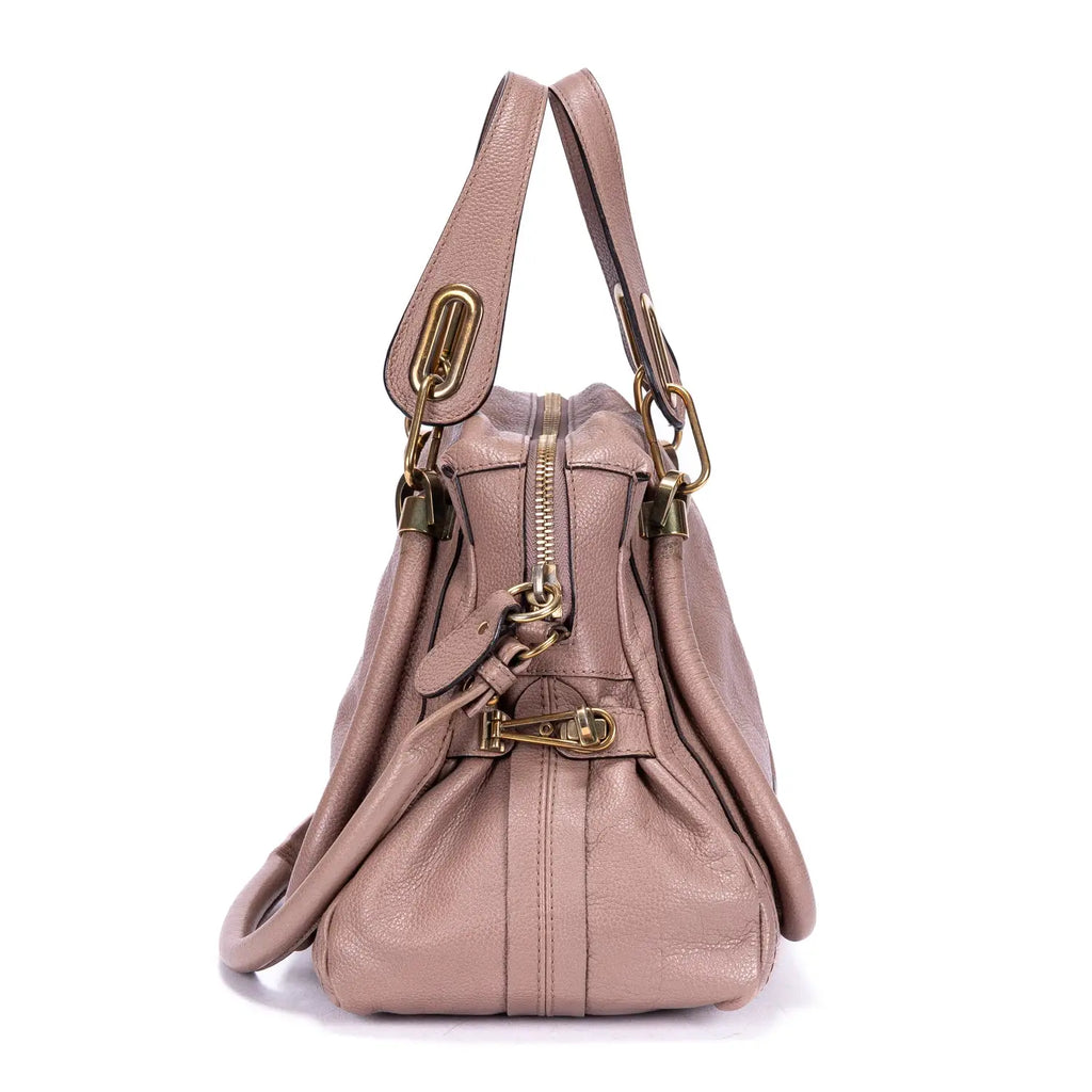 Sac à bandoulière Paraty moyen en cuir de veau grainé rose foncé
