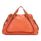 Bolso de mano mediano Paraty de piel de becerro granulada naranja