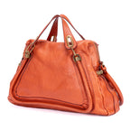 Bolso de mano mediano Paraty de piel de becerro granulada naranja