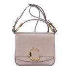 Sac porté épaule Mini C Crossbody Mini en cuir de veau lisse taupe