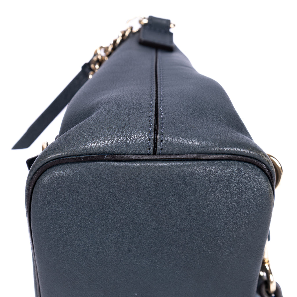 Mochila Faye Mochila Mini de piel de becerro lisa/ante azul marino