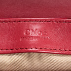 Sac bandoulière C en cuir de veau rouge gaufré crocodile