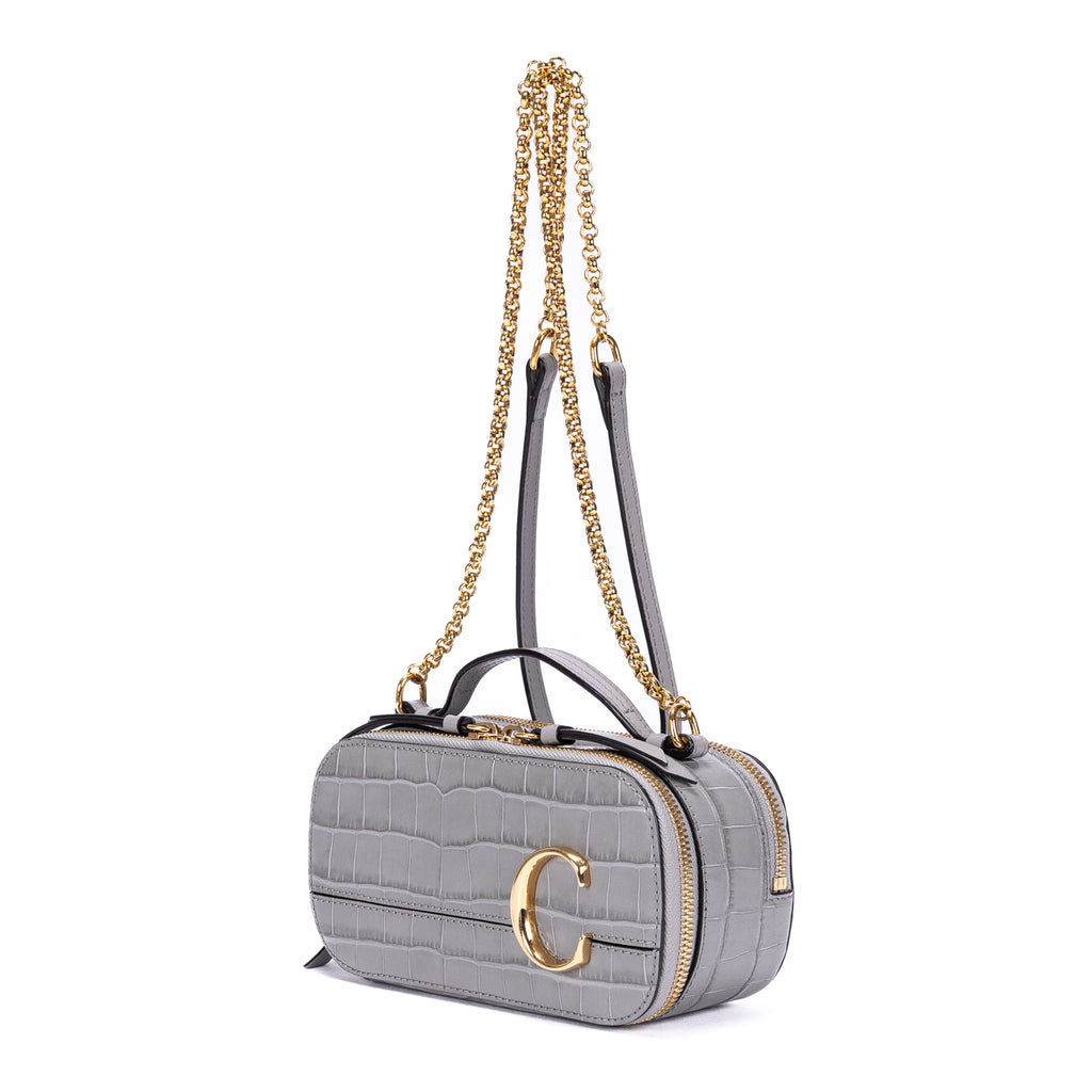 Sac à bandoulière C en cuir de veau gaufré façon crocodile gris
