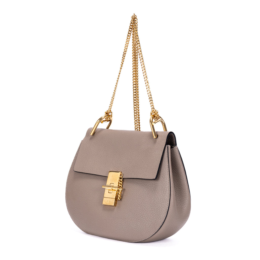 Sac porté épaule Drew petit modèle en cuir de veau grainé taupe