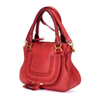 Bolso de hombro mediano Marcie Saddle Piel de becerro granulada roja